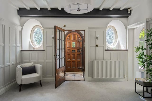 The sense of grandeur at the £800,000 house hits you as soon as you step through the front door and into the characterful entrance hallway. It features original panelling, white-washed ceiling beams and feature decorative windows.