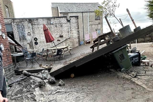 Damage left by the floodwaters at Chesterfield's Olympia House Antiques Centre. Photo: Derbyshire Times