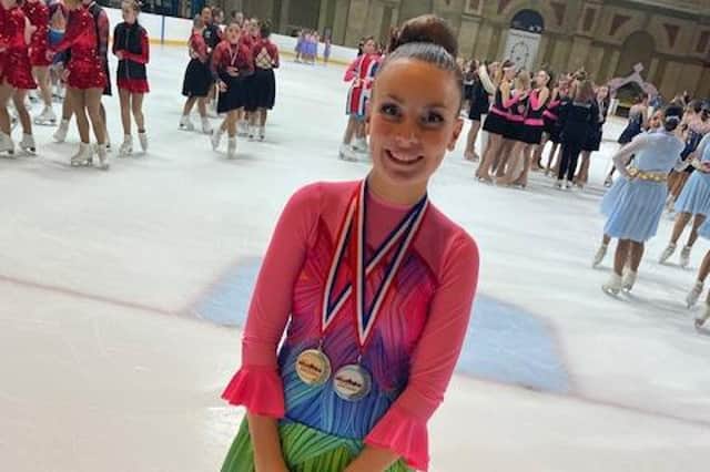 Holly White with her medals at Alexandra Palace.