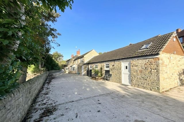 The property at Calow Lane, Hasland comprises a four bedroom farmhouse and barn conversion annex which has one bedroom
