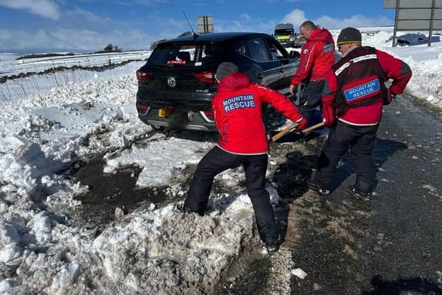 Buxton Mountain Rescue Team digging out a car over the weekend. Pic submitted