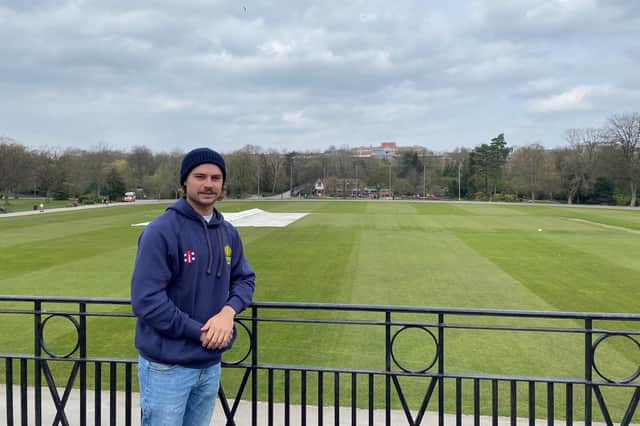 Chesterfield's Australian pace bowler James La Brooy on the pavilion balcony at Queen's Park