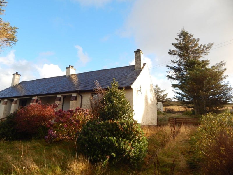 2-bedroom semi-detached bungalow - offers over £100,000.
