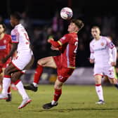 Billy Fewster of Alfreton Town heads the ball whilst under pressure from Liam Gordon of Walsall. (Photo by Matt McNulty/Getty Images)