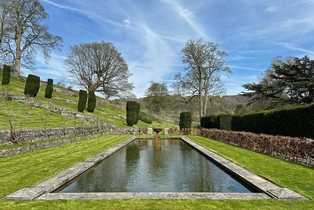 The mirror pond is fed by a stone trough and is one of the features of the magnificent gardens.