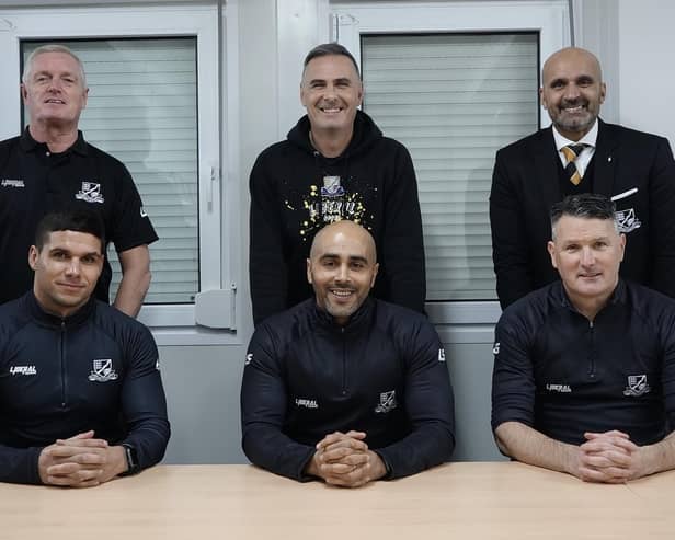 Steve Chettle (back, centre) and Mark Clifford (front, centre) have new roles at Basford United.