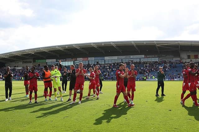 Walsall players applaud their fans at full-time. (Photo by Matthew Lewis/Getty Images)