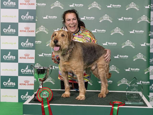 Claire Whitehead with Diesel, Winner of the Scruffts Family CrossBread of the Year 2024. Credit: BeatMedia/The Kennel Club