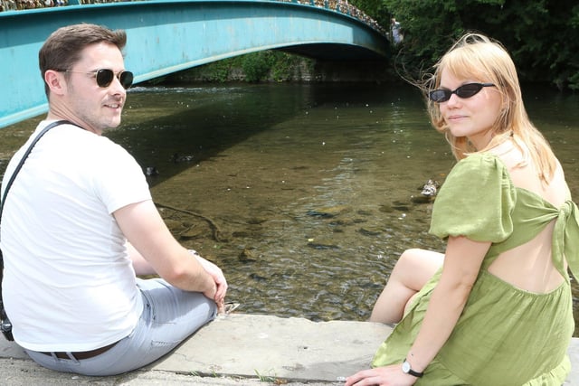 Mike Lea and Judith Westerlund cool off by the river in Bakewell.