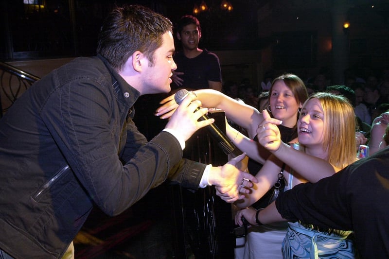 Chris from Pop Idol woos his audience at Kingdom in July 2004
