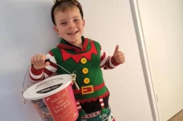 Billy Dawes, 6, has already exceeded his target to help light up Pleasley for Christmas.