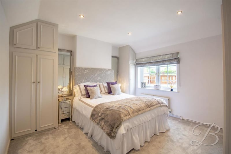 The second bedroom lacks for nothing in comfort. Fitted wardrobes, a carpeted floor, central-heating radiator and a window to the back are among its assets.