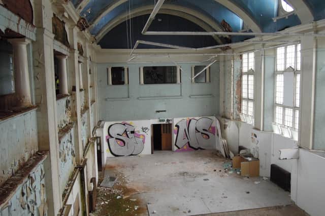 Pictures inside the old Heanor Grammar School building show walls covered in graffiti.