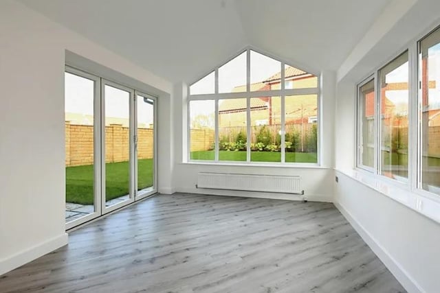 You'll be surrounded by views of the rear garden in this room.