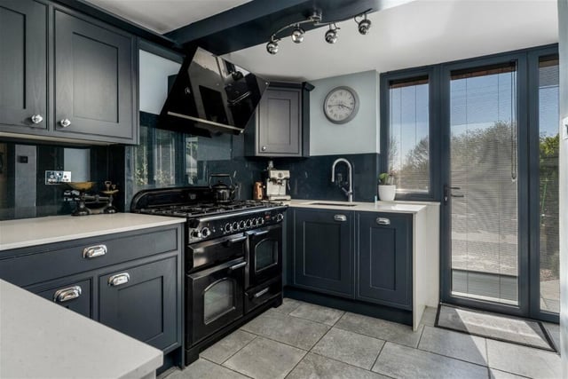 Marvel at the beautiful, hand-made kitchen that has a range of matching wall and base-level units, quartz work surfaces and Belfast sink. A range cooker is available to buy by separate negotiation.