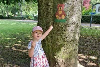 A youngster on the teddy's bears picnic trail which brought people into town during August.
