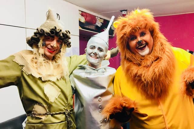 Tom as the Cowardly Lion with Angie Burns was the tin man and Jamie Valentine was the scarecrow in the  Community Players production of The Wizard of Oz at Hasland Playhouse in 2019.