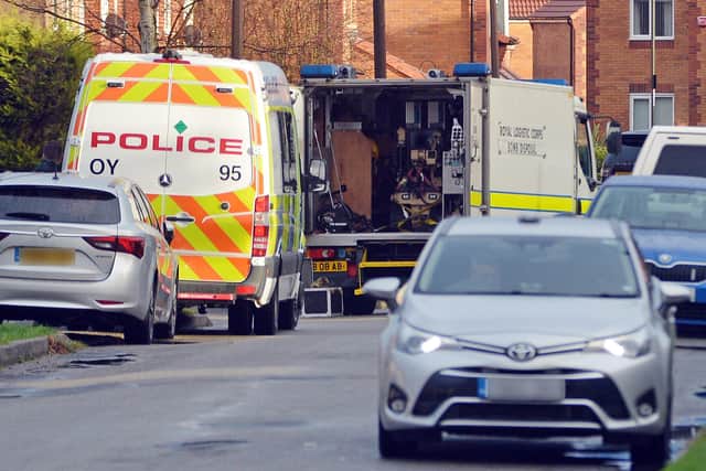 Police and an Army bomb team in Holmewood on Monday. Picture by Brian Eyre.