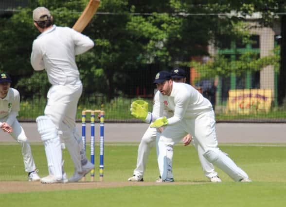 Callum Hiron keeping wicket for Chesterfield Seconds against Ambergate before scoring 24. Photo: Tim Kirk.