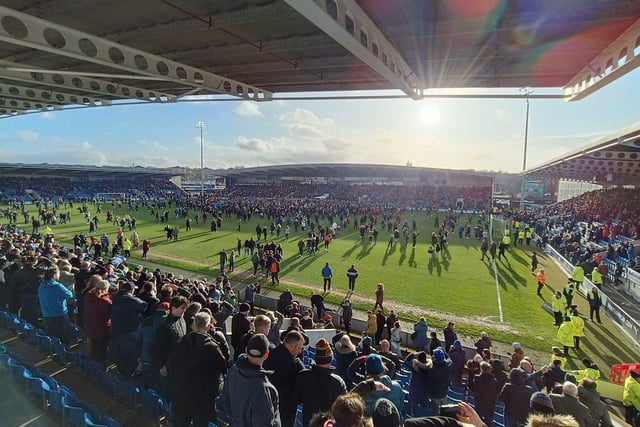 Shot of the Chesterfield pitch invasion as they secure promotion, taken by Tom Jones