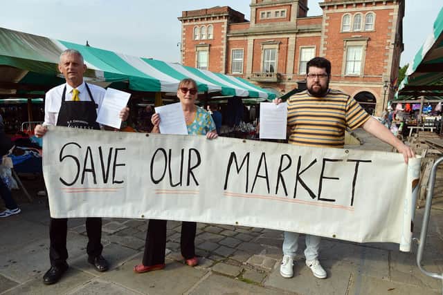 Traders Simon Davidson, Steph Mannion and Luke Povey are concerned about the 'poor' consultation on plans to revamp Chesterfield market. Pictures by Brian Eyre.