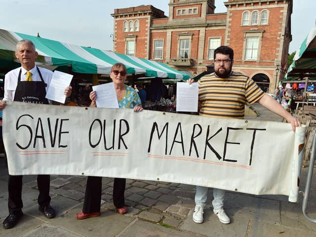 Traders Simon Davidson, Steph Mannion and Luke Povey are concerned about the 'poor' consultation on plans to revamp Chesterfield market. Pictures by Brian Eyre.
