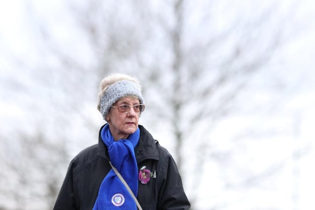 A fan of Chesterfield waits outside the stadium prior to the Vanarama National League match between Chesterfield and FC Halifax Town on December 28, 2021.