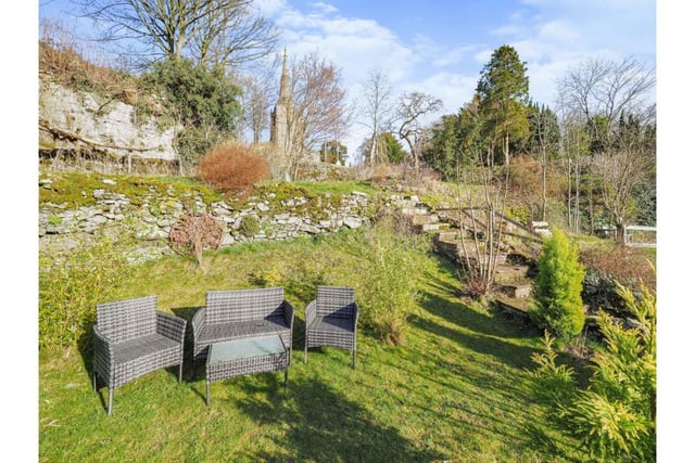 The tiered garden has lawned areas on which to sit and relax.