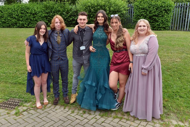 Tupton Hall school students wear prom outfits to raise money for charity.