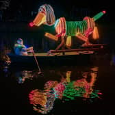 Boat builders Richard Wood, Christine Dence and Pete Hartshorn have won the boat vote at this year’s Matlock Bath Illuminations with their stunning Slinky Dog model. Credit: Simon Beynon/Derbyshire Dales District Council
