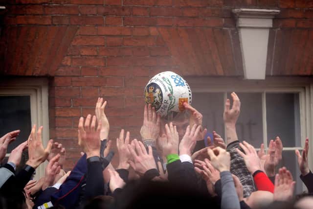 players during the annual Royal Shrovetide football match in Ashbourne,