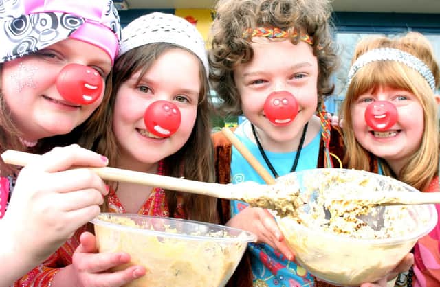 Emily Brooks, Rachel Smith, Charlotte Dewberry and Anna Bavilacqua have fun making cookies for Comic Relief at Brimington Junior School in 2009.