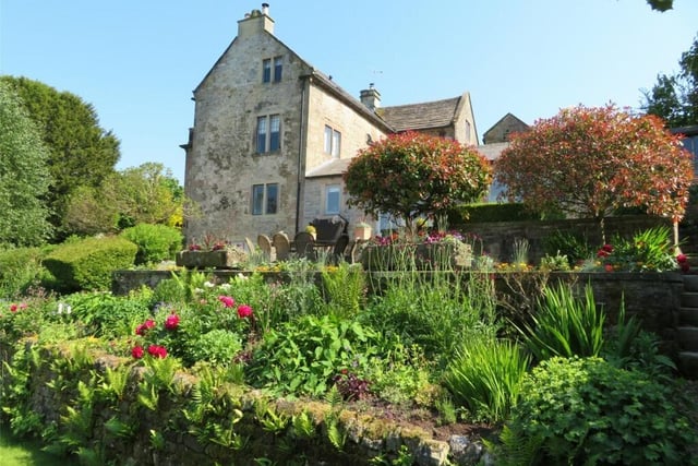 The three-storey accommodation in the house offers beautiful views of the garden.