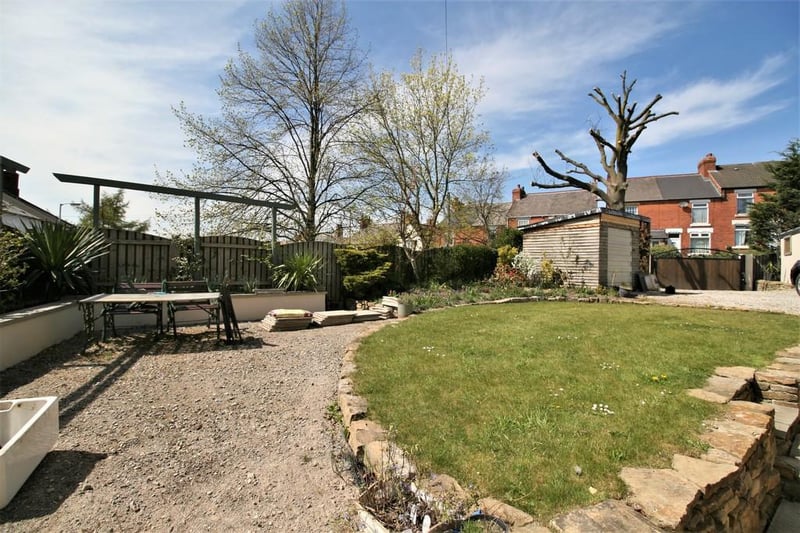 There is a lawn area and sitting area ideal for entertaining.