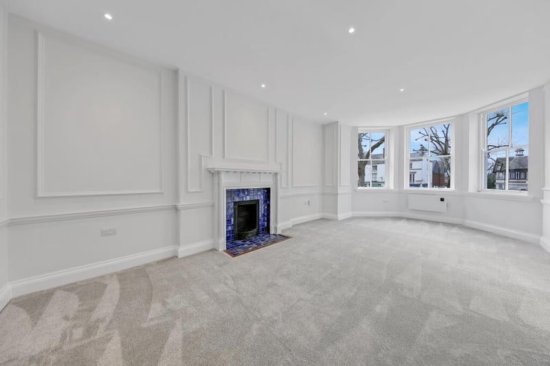 This fireplace was discovered in renovation work on the building and preserved as a focal point. This apartment has one bedroom and is available to rent at £1,000 per calendar month.