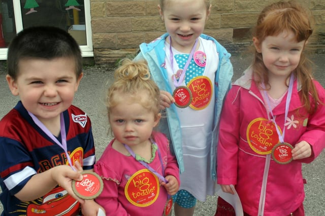 Elliot Ratcliffe, Ruby-Lily Gath, Chrisoulla Lazari and Chloe Wakeling, left to right, from Little Chatterbox Nursery, Tupton, show off their medals after completing a sponsored walk.