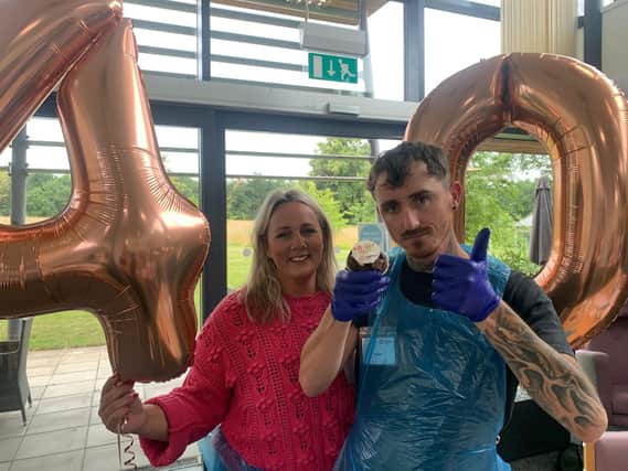 A brother and sister receiving support following a diagnosis of Huntington’s Disease, and a woman whose daughter and husband died within a few months of each other, have come together to help ice over 3,000 cakes being given away to celebrate a charity’s 40th birthday.