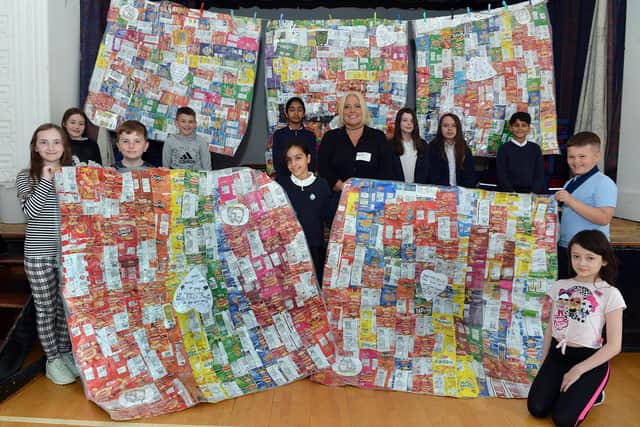 Chesterfield Spire Junior School crisp packet project. Members of the school council with Sarah Sammans, lead nurse at Pathways of Chesterfield.