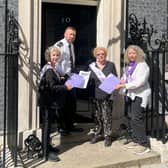 WASPI delegates Angela Madden, second right, with Gill Saul, right, and Shelagh Simmonds hand in the petition at 10 Downing Street.