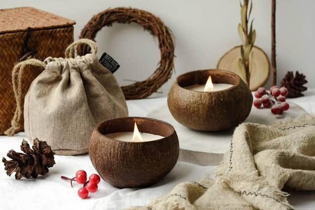 Coconut shells can be used as candle holders.