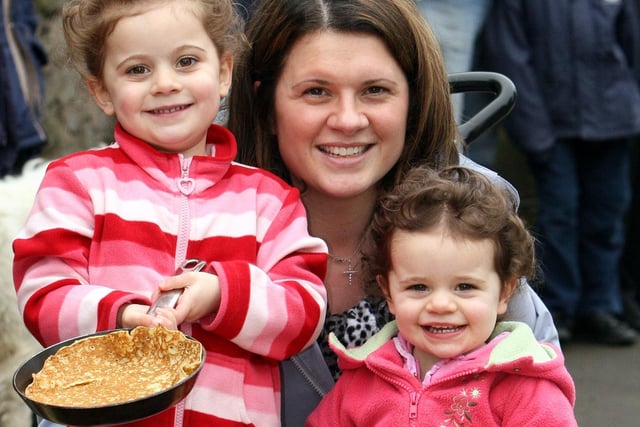 Michelle Bullock of Winster and daughters Lillie,4, and Maggie,2, get ready for the annual Winster Pancake Races in 2007.