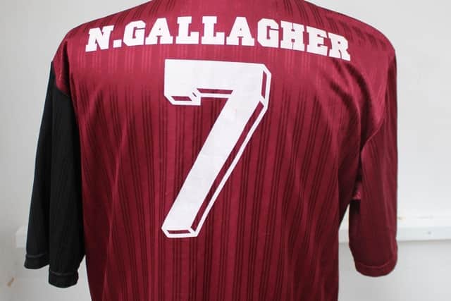 Noel Gallagher's football shirt is expected to raise at least £1,000 at auction on November 2, 2021.