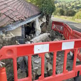 The incident happened on the A632 in Kelstedge Village at 11.30 pm last night, on October 17 when a car mounted a public footpath colliding with a dry stone wall taking down part of a residential property.