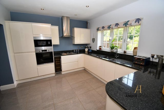 We start our tour of the Selston property on the lower floor, where the highlight is this well-appointed kitchen. Spanning the width of the property and overlooking the back garden, it is equipped with integral appliances, which include a fitted oven and microwave.