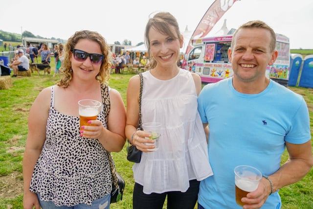 Eleanor Weston, Jennifer Hambleton and Billy Naylor enjoying  a drink at Longnor Races. Photo Brian Eyre