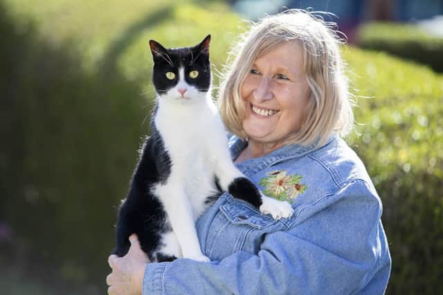 Zebby was honoured in recognition of how he supports his deaf owner Genevieve Moss, 66, by alerting her to sounds around the home. Lucy Ray/PA Wire