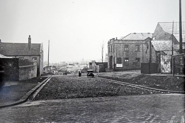 This image shows Rose Hill and the new road from Glumangate to the Town Hall site under construction in 1936.
