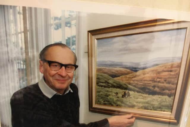Hugh Penfold with one of his paintings.