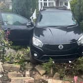 Police in north Derbyshire have posted pictures of a car which ended up in a north Deryshire garden. Image: Derbyshire police.