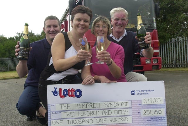 Pictured at Clowne Fire station, is Part time fireman  Adrian Temprell and his family lottery syndicate of wife Georgina and his parents Betty and Bernard. They were celebrating  their £251,150 lottery win after matching five numbers and the bonus in Saturday, September 6 draw.